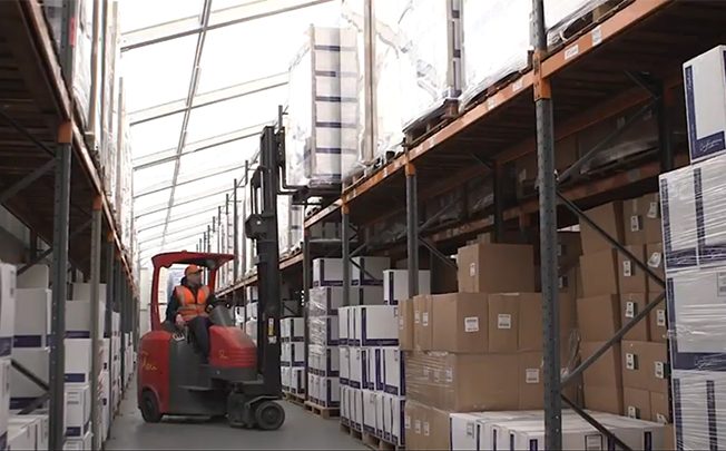 Forklift in warehouse